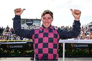 31 July 2025; Jockey Jack Kennedy celebrates after winning the Guinness Galway Hurdle Handicap on Ndaawi, following a steward's enquiry, during day four of the Galway Races Summer Festival at Ballybrit Racecourse in Galway. Photo by Seb Daly/Sportsfile