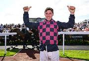 31 July 2025; Jockey Jack Kennedy celebrates after winning the Guinness Galway Hurdle Handicap on Ndaawi, following a steward's enquiry, during day four of the Galway Races Summer Festival at Ballybrit Racecourse in Galway. Photo by Seb Daly/Sportsfile