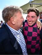 31 July 2025; Owner Michael Earl, left, of the Easyfix syndicate, and jockey Jack Kennedy celebrate after sending out Ndaawi to win the Guinness Galway Hurdle Handicap during day four of the Galway Races Summer Festival at Ballybrit Racecourse in Galway. Photo by Seb Daly/Sportsfile