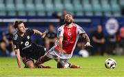 31 July 2025; Jake Mulraney of St Patrick's Athletic is tackled by Ivans Patrikejevs of Kalju during the UEFA Conference League Second Qualifying Round second leg match between Nõmme Kalju FC and St Patrick's Athletic at Lilleküla Stadium in Tallinn, Estonia. Photo by Evaldas Semiotas/Sportsfile