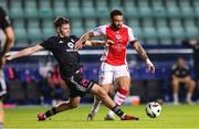 31 July 2025; Jake Mulraney of St Patrick's Athletic is tackled by Ivans Patrikejevs of Kalju during the UEFA Conference League Second Qualifying Round second leg match between Nõmme Kalju FC and St Patrick's Athletic at Lilleküla Stadium in Tallinn, Estonia. Photo by Evaldas Semiotas/Sportsfile