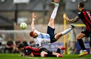 1 August 2025; James Bolger of Drogheda United and Cian Byrne of Bohemians collide during the SSE Airtricity Men's Premier Division match between Bohemians and Drogheda United at Dalymount Park in Dublin. Photo by Seb Daly/Sportsfile