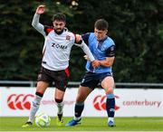 1 August 2025; Declan McDaid of Dundalk in action against Carl Lennox of UCD during the SSE Airtricity Men's First Division match between UCD and Dundalk at UCD Bowl in Belfield, Dublin. Photo by Thomas Flinkow/Sportsfile