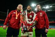 2 August 2025; British & Irish Lions players, from left, Finlay Bealham, Bundee Aki and Mack Hansen with the series trophy after the third test match between Australia and the British & Irish Lions at Accor Stadium in Sydney, Australia. Photo by Brendan Moran/Sportsfile