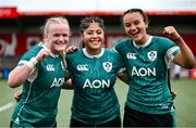 2 August 2025; Ireland debutants, from left, Ailish Quinn, Ivana Kiripati and Nancy McGillivray celebrate after their side's victory in the Women's Rugby World Cup warm-up match between Ireland and Scotland at Virgin Media Park in Cork. Photo by Shauna Clinton/Sportsfile