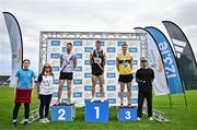 2 August 2025; Athletics Ireland President Brid Golden, second from left, and Adidas representative Daniel Laube, far right, with Senior men's 200m medallists Marcus Lawler of Clonliffe Harriers AC, Dublin, centre, gold, Darragh McConville of Dundrum South Dublin AC, Dublin, left, silver, and Adam Murphy of Tinryland AC, Carlow, right, bronze, during day one of the 153rd 123.ie National Track & Field Senior Championships at Morton Stadium in Dublin. Photo by Sam Barnes/Sportsfile