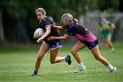 2 August 2025; Emma Russell of Cumann Pheadair Naofa, Down, left, in action against Saoirse McGuinness of St Manchan's, Offaly, right, in the Intermediate competition at the O’Neills All-Ireland Club 7s competitions at Naomh Mearnóg GAA Club in Portmarnock, Dublin. Photo by Piaras Ó Mídheach/Sportsfile