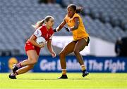 3 August 2025; Eilís Hand of Louth in action against Omolara Dahunsi of Antrim during the TG4 All-Ireland Ladies Football Junior Championship final match between Antrim and Louth at Croke Park in Dublin. Photo by Piaras Ó Mídheach/Sportsfile