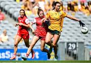 3 August 2025; Lucy White of Louth is tackled by Sarah O'Neill of Antrim during the TG4 All-Ireland Ladies Football Junior Championship final match between Antrim and Louth at Croke Park in Dublin. Photo by Shauna Clinton/Sportsfile