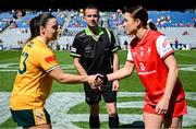 3 August 2025; Referee Kevin Corcoran is joined by Antrim captain Bronagh Devlin, left, and Louth captain Áine Breen for the coin toss before the TG4 All-Ireland Ladies Football Junior Championship final match between Antrim and Louth at Croke Park in Dublin. Photo by Shauna Clinton/Sportsfile