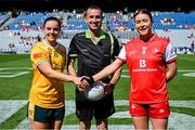 3 August 2025; Referee Kevin Corcoran with Antrim captain Bronagh Devlin, left, and Louth captain Áine Breen before the TG4 All-Ireland Ladies Football Junior Championship final match between Antrim and Louth at Croke Park in Dublin. Photo by Shauna Clinton/Sportsfile