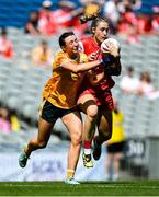 3 August 2025; Kate Flood of Louth in action against Sarah O'Neill of Antrim during the TG4 All-Ireland Ladies Football Junior Championship final match between Antrim and Louth at Croke Park in Dublin. Photo by Shauna Clinton/Sportsfile