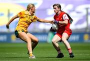 3 August 2025; Louise Byrne of Louth in action against Theresa Mellon of Antrim during the TG4 All-Ireland Ladies Football Junior Championship final match between Antrim and Louth at Croke Park in Dublin. Photo by Shauna Clinton/Sportsfile