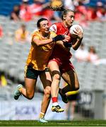3 August 2025; Kate Flood of Louth in action against Sarah O'Neill of Antrim during the TG4 All-Ireland Ladies Football Junior Championship final match between Antrim and Louth at Croke Park in Dublin. Photo by Shauna Clinton/Sportsfile