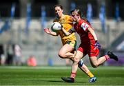 3 August 2025; Louise Byrne of Louth in action against Laura Agnew of Antrim during the TG4 All-Ireland Ladies Football Junior Championship final match between Antrim and Louth at Croke Park in Dublin. Photo by Shauna Clinton/Sportsfile