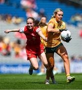 3 August 2025; Aoife Kelly of Antrim in action against Seoda Matthews of Louth during the TG4 All-Ireland Ladies Football Junior Championship final match between Antrim and Louth at Croke Park in Dublin. Photo by Shauna Clinton/Sportsfile
