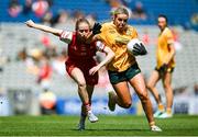 3 August 2025; Aoife Kelly of Antrim in action against Seoda Matthews of Louth during the TG4 All-Ireland Ladies Football Junior Championship final match between Antrim and Louth at Croke Park in Dublin. Photo by Shauna Clinton/Sportsfile