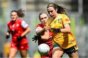 3 August 2025; Maria O'Neill of Antrim in action against Rachel Beirth of Louth during the TG4 All-Ireland Ladies Football Junior Championship final match between Antrim and Louth at Croke Park in Dublin. Photo by Shauna Clinton/Sportsfile