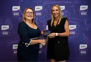 3 August 2025; Uachtarán Cumann Peil Gael na mBan, Trina Murray, makes a presentation to Elaine Power of Waterford during a pre-match event at Croke Park to honour the squads who represented Mayo and Waterford in the 1999 and 2000 All-Ireland Ladies Senior Football Championship Finals. Photo by Seb Daly/Sportsfile