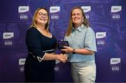3 August 2025; Uachtarán Cumann Peil Gael na mBan, Trina Murray, makes a presentation to Aoife Murphy of Waterford during a pre-match event at Croke Park to honour the squads who represented Mayo and Waterford in the 1999 and 2000 All-Ireland Ladies Senior Football Championship Finals. Photo by Seb Daly/Sportsfile