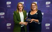 3 August 2025; Uachtarán Cumann Peil Gael na mBan, Trina Murray, makes a presentation to Niamh Barry during a pre-match event at Croke Park to honour the squads who represented Mayo and Waterford in the 1999 and 2000 All-Ireland Ladies Senior Football Championship Finals. Photo by Seb Daly/Sportsfile