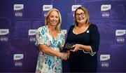 3 August 2025; Uachtarán Cumann Peil Gael na mBan, Trina Murray, makes a presentation to Claire Ryan of Waterford during a pre-match event at Croke Park to honour the squads who represented Mayo and Waterford in the 1999 and 2000 All-Ireland Ladies Senior Football Championship Finals. Photo by Seb Daly/Sportsfile