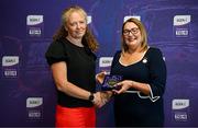 3 August 2025; Uachtarán Cumann Peil Gael na mBan, Trina Murray, makes a presentation to Martina O’Ryan of Waterford during a pre-match event at Croke Park to honour the squads who represented Mayo and Waterford in the 1999 and 2000 All-Ireland Ladies Senior Football Championship Finals. Photo by Seb Daly/Sportsfile