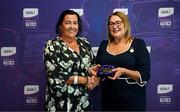 3 August 2025; Uachtarán Cumann Peil Gael na mBan, Trina Murray, makes a presentation to Deirdre Nagle of Waterford during a pre-match event at Croke Park to honour the squads who represented Mayo and Waterford in the 1999 and 2000 All-Ireland Ladies Senior Football Championship Finals. Photo by Seb Daly/Sportsfile