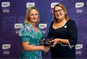 3 August 2025; Uachtarán Cumann Peil Gael na mBan, Trina Murray, makes a presentation to Triona Whyte of Waterford during a pre-match event at Croke Park to honour the squads who represented Mayo and Waterford in the 1999 and 2000 All-Ireland Ladies Senior Football Championship Finals. Photo by Seb Daly/Sportsfile