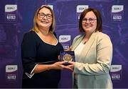 3 August 2025; Uachtarán Cumann Peil Gael na mBan, Trina Murray, makes a presentation to Sarah Hickey of Waterford during a pre-match event at Croke Park to honour the squads who represented Mayo and Waterford in the 1999 and 2000 All-Ireland Ladies Senior Football Championship Finals. Photo by Seb Daly/Sportsfile