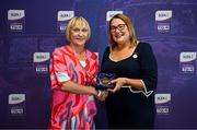 3 August 2025; Uachtarán Cumann Peil Gael na mBan, Trina Murray, makes a presentation to Julieann Torpey of Waterford during a pre-match event at Croke Park to honour the squads who represented Mayo and Waterford in the 1999 and 2000 All-Ireland Ladies Senior Football Championship Finals. Photo by Seb Daly/Sportsfile