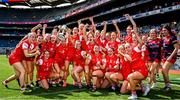 3 August 2025; The Louth celebrates with the cup after their side's victory in the TG4 All-Ireland Ladies Football Junior Championship final match between Antrim and Louth at Croke Park in Dublin. Photo by Piaras Ó Mídheach/Sportsfile