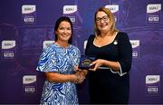 3 August 2025; Uachtarán Cumann Peil Gael na mBan, Trina Murray, makes a presentation to Orla Casby of Mayo during a pre-match event at Croke Park to honour the squads who represented Mayo and Waterford in the 1999 and 2000 All-Ireland Ladies Senior Football Championship Finals. Photo by Seb Daly/Sportsfile
