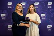 3 August 2025; Uachtarán Cumann Peil Gael na mBan, Trina Murray, makes a presentation to Nuala Ó Shé of Mayo during a pre-match event at Croke Park to honour the squads who represented Mayo and Waterford in the 1999 and 2000 All-Ireland Ladies Senior Football Championship Finals. Photo by Seb Daly/Sportsfile