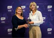 3 August 2025; Uachtarán Cumann Peil Gael na mBan, Trina Murray, makes a presentation to Denise Horan of Mayo during a pre-match event at Croke Park to honour the squads who represented Mayo and Waterford in the 1999 and 2000 All-Ireland Ladies Senior Football Championship Finals. Photo by Seb Daly/Sportsfile