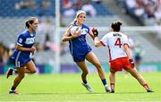 3 August 2025; Eva Galvin of Laois in action against Eimear Quinn of Tyrone during the TG4 All-Ireland Ladies Football Intermediate Championship final match between Laois and Tyrone at Croke Park in Dublin. Photo by Piaras Ó Mídheach/Sportsfile