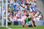 3 August 2025; Laois goalkeeper Eimear Barry is tackled by Niamh O'Neill of Tyrone during the TG4 All-Ireland Ladies Football Intermediate Championship final match between Laois and Tyrone at Croke Park in Dublin. Photo by Shauna Clinton/Sportsfile