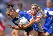 3 August 2025; Emily Lacey of Laois in action against Jayne Lyons of Tyrone during the TG4 All-Ireland Ladies Football Intermediate Championship final match between Laois and Tyrone at Croke Park in Dublin. Photo by Shauna Clinton/Sportsfile