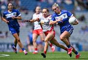 3 August 2025; Emma Lawlor of Laois in action against Gráinne McKenna of Tyrone during the TG4 All-Ireland Ladies Football Intermediate Championship final match between Laois and Tyrone at Croke Park in Dublin. Photo by Shauna Clinton/Sportsfile