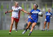 3 August 2025; Eva Galvin of Laois in action against Méabh Mallon of Tyrone during the TG4 All-Ireland Ladies Football Intermediate Championship final match between Laois and Tyrone at Croke Park in Dublin. Photo by Shauna Clinton/Sportsfile