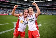 3 August 2025; Méabh Corrigan, left, and Cara McCrossan of Tyrone celebrate after their side's victory in the TG4 All-Ireland Ladies Football Intermediate Championship final match between Laois and Tyrone at Croke Park in Dublin. Photo by Piaras Ó Mídheach/Sportsfile