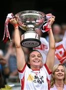 3 August 2025; Tyrone captain Aoibhinn McHugh lifts the Mary Quinn Memorial cup after the TG4 All-Ireland Ladies Football Intermediate Championship final match between Laois and Tyrone at Croke Park in Dublin. Photo by Piaras Ó Mídheach/Sportsfile