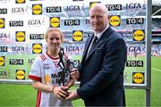 3 August 2025; Sorcha Gormley of Tyrone receives the Player of the Match award from Rónán Ó Coisdealbha, Head of Sport, TG4, following the TG4 All-Ireland Ladies Football Intermediate Championship final match between Laois and Tyrone at Croke Park in Dublin. Photo by Shauna Clinton/Sportsfile