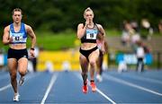 3 August 2025; Lauren Roy of Fast Twitch AC, right, and Sive O'Toole of St Laurence O'Toole AC, Carlow, compete in the senior women's 100m semi-finals during day two of the 153rd 123.ie National Track & Field Senior Championships at Morton Stadium in Dublin. Photo by Sam Barnes/Sportsfile