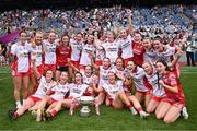 3 August 2025; The Tyrone players celebrate with the cup after their side's victory in the TG4 All-Ireland Ladies Football Intermediate Championship final match between Laois and Tyrone at Croke Park in Dublin. Photo by Piaras Ó Mídheach/Sportsfile
