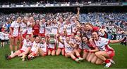 3 August 2025; The Tyrone players celebrate with the cup after their side's victory in the TG4 All-Ireland Ladies Football Intermediate Championship final match between Laois and Tyrone at Croke Park in Dublin. Photo by Piaras Ó Mídheach/Sportsfile
