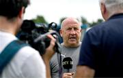 3 August 2025; Waterford head coach John Coleman is interviewed for LOITV before the SSE Airtricity Men's Premier Division match between Waterford and St Patrick's Athletic at Regional Sports Centre in Waterford. Photo by Tyler Miller/Sportsfile