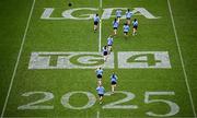 3 August 2025; Dublin players make their way out to the team photograph before the TG4 All-Ireland Ladies Football Senior Championship final match between Dublin and Meath at Croke Park in Dublin. Photo by Seb Daly/Sportsfile