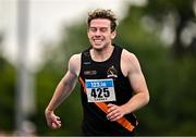 3 August 2025; Niall Carney of Clonliffe Harriers AC, Dublin, crosses the line to win the senior men's 400m hurdles during day two of the 153rd 123.ie National Track & Field Senior Championships at Morton Stadium in Dublin. Photo by Sam Barnes/Sportsfile