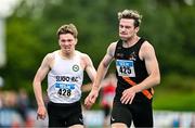 3 August 2025; Niall Carney of Clonliffe Harriers AC, Dublin, right, on his way to winning the senior men's 400m hurdles final ahead of Briain Cullinan of Sligo AC, left, who finished second, during day two of the 153rd 123.ie National Track & Field Senior Championships at Morton Stadium in Dublin. Photo by Sam Barnes/Sportsfile